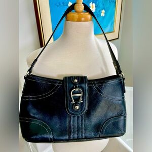 Black smooth leather Etienne Aigner shoulder bag with silver hardware.